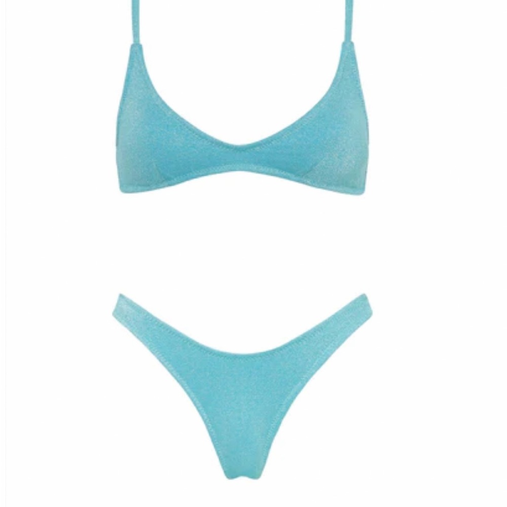 Never worn before fits small: top is a medium bottom is large